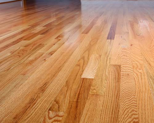 Polished hardwood oak flooring with warm tones